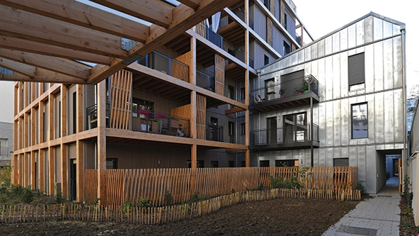 Construction on an outdoor garage converting it into housing units