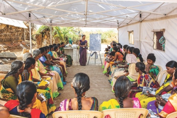 women in india having a meeting in a sunny room