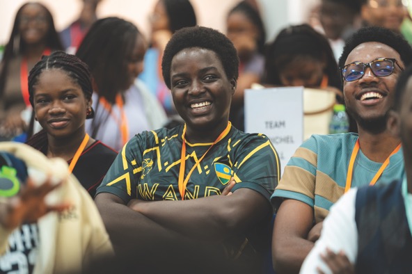 smiling students sitting in a university classroom