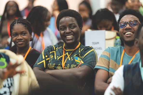 smiling students sitting in a university classroom