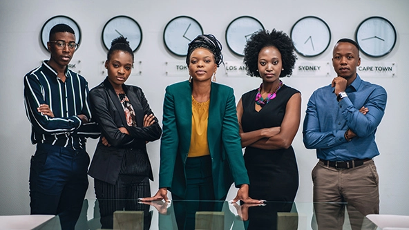 Portrait of business team of Black young people standing in the office.