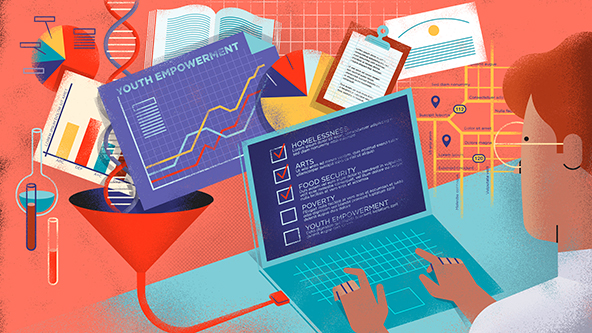 A person sits at a computer with many charts and scientific measurement tools floating around