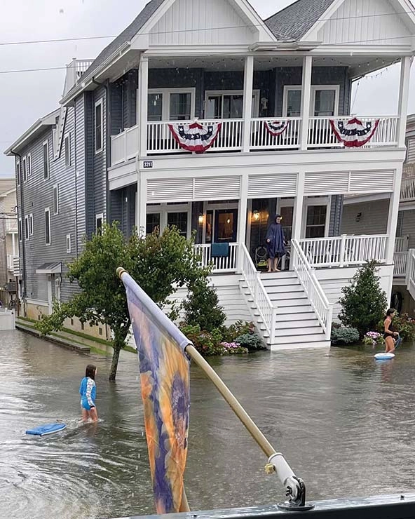 A house surrounded by flood waters.
