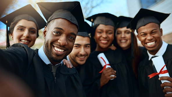 College graduates in caps and gowns