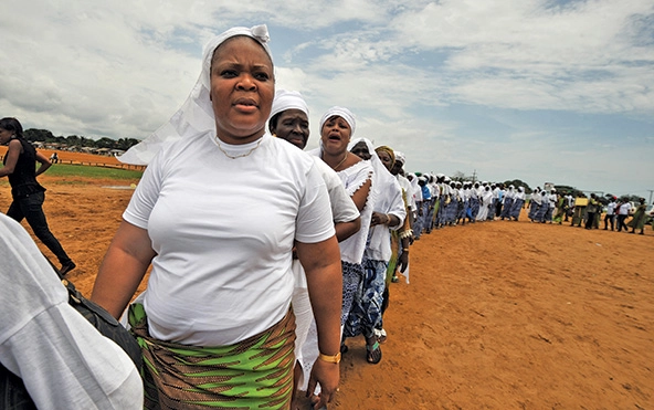 Nobel Peace Prize winner Leymah Gbowee leads a gathering of fellow women’s rights activists in Monrovia.