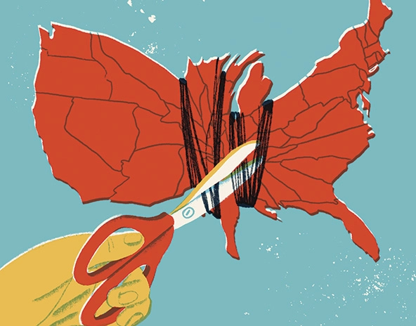Hand with scissors cutting string tightened around the middle of a map of the United States