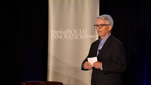 SSIR Editor-in-Chief Eric Nee speaking to an audience at the Nonprofit Management Institute