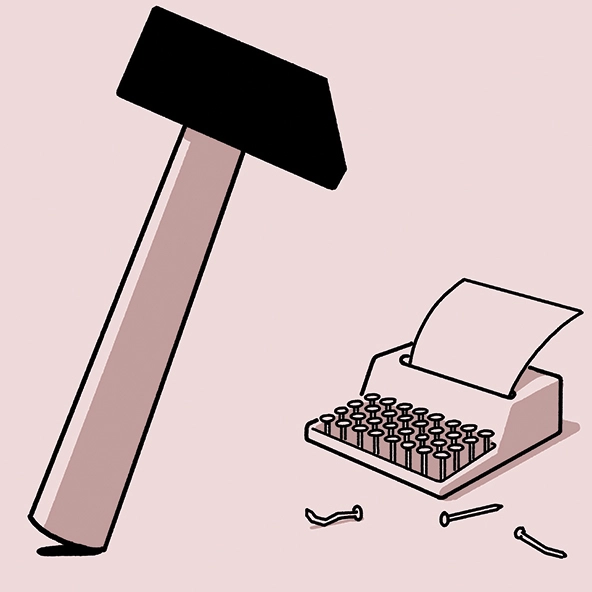 hammer aiming for a typewriter keyboard