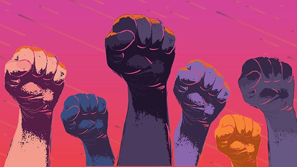 Group of protesters’ hands in the air