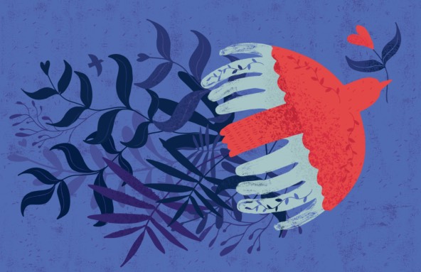 peace dove in flight with background of leaves