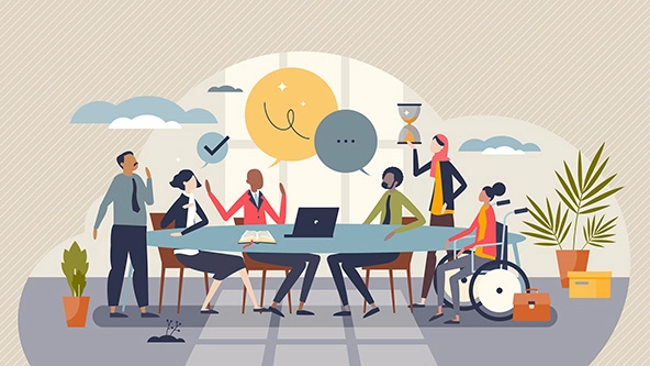 team of diverse young people around a table sharing ideas