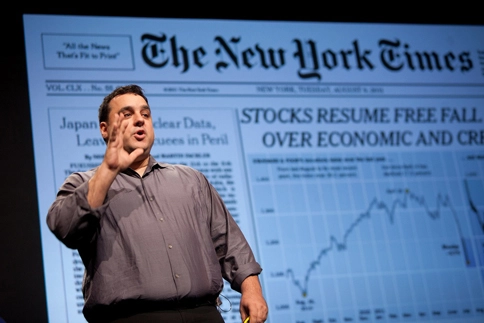 Andrew Zolli, curator of PopTech, introduces the 2011 conference's World Balancing theme to attendees in Camden, Me. (Photograph by Kris Krüg for PopTech)